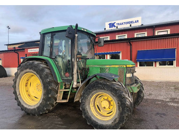 Farm tractor JOHN DEERE 6310