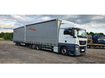 Curtainsider truck MAN TGX